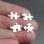 sterling silver jigsaw puzz..